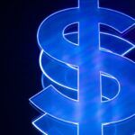 Glowing blue neon dollar sign on a dark background, symbolizing financial recovery and the goal of collecting on a legal judgment.